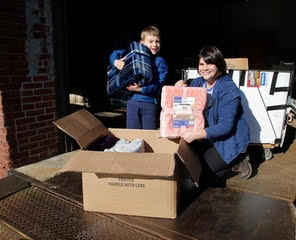 Woman and Child Unpacking